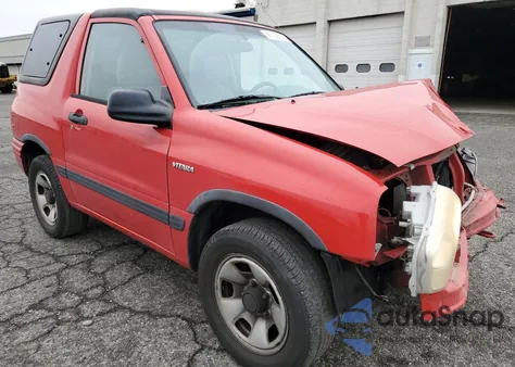 1999 Suzuki Vitara Ja from USA, damaged, VIN 2S3TA52C1X6102618